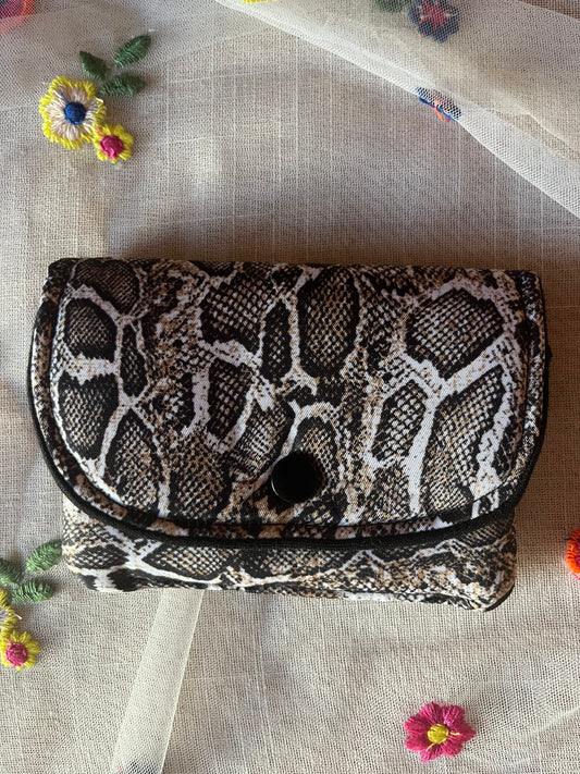 MONEDER AMB SOLAPA - animal print SERP