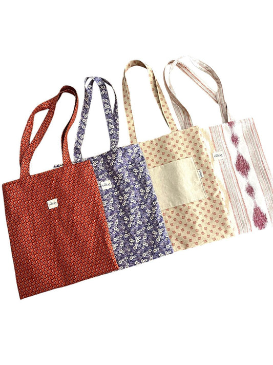 TOTEBAG REVERSIBLE - ESTAMPAT GRANATE I TOCS TARONJA